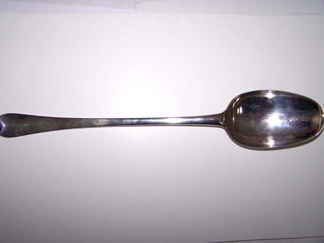 An English Queen Anne Period Silver Basting Spoon made in London in 1712 having a crest depicting a Bat. — image 2